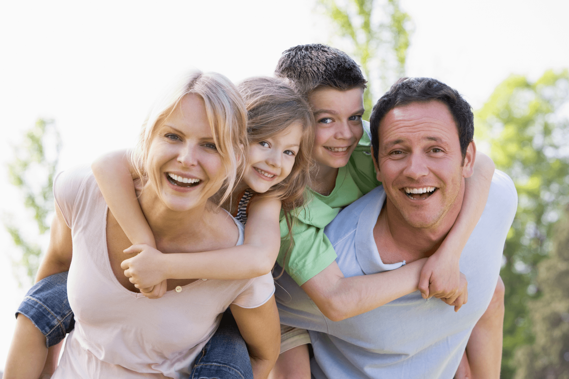 Happy family with children outdoors